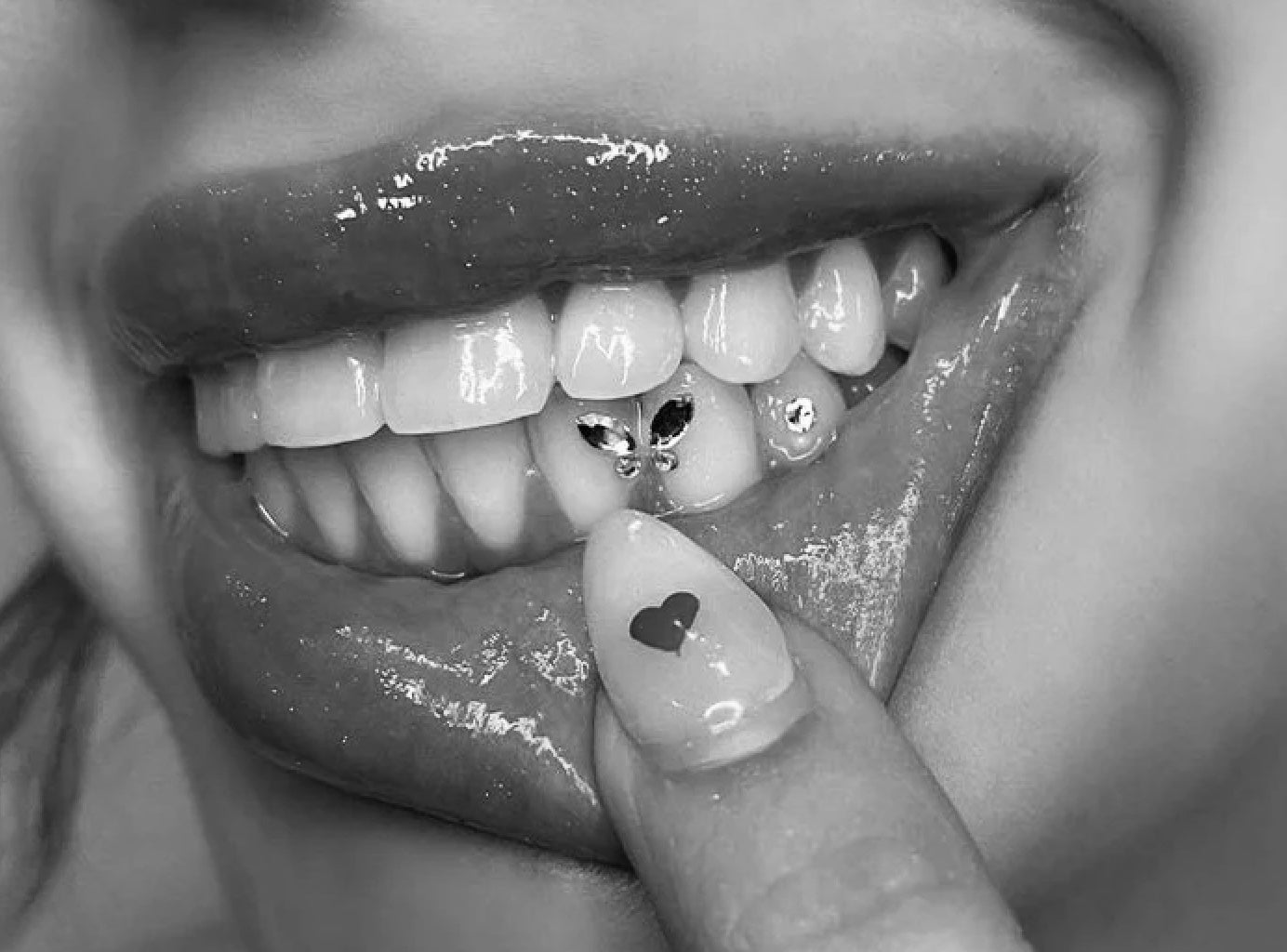 Close-up of a mouth with a butterfly design