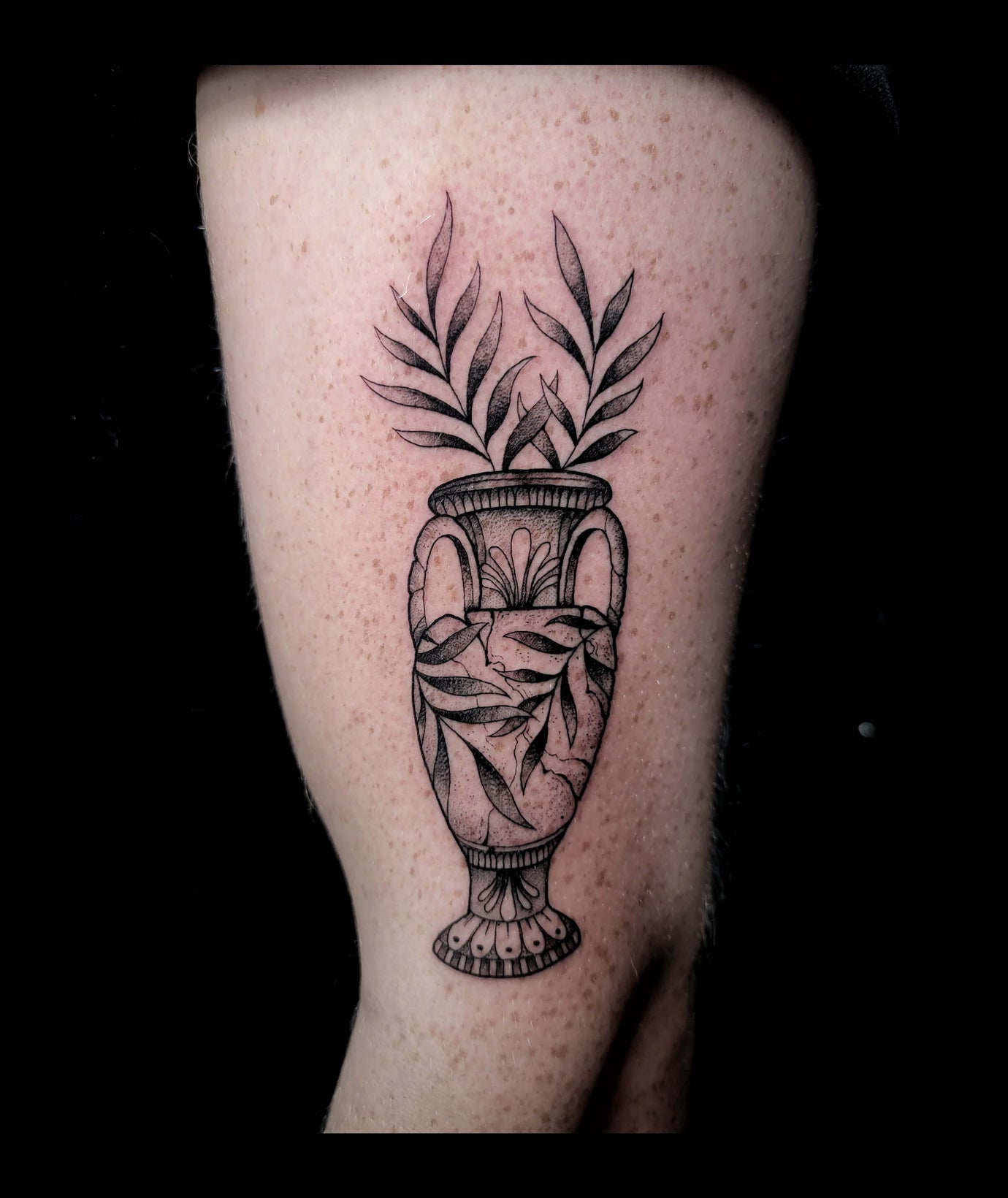 Minimalist floral fine line tattoo design Ireland