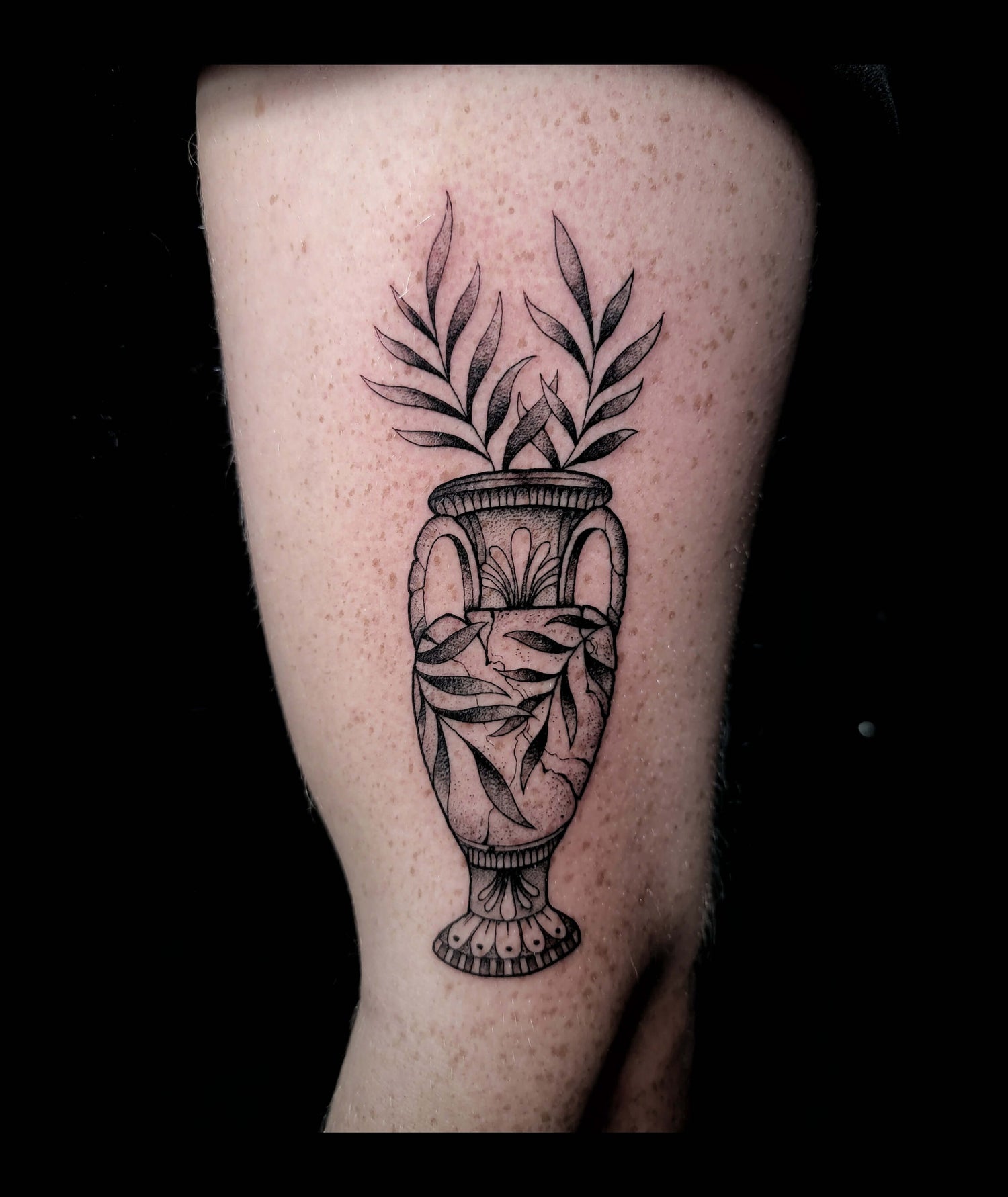 Minimalist floral fine line tattoo design Ireland