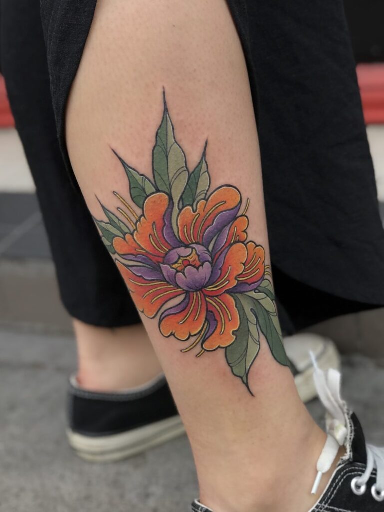 Neotraditional flower tattoo