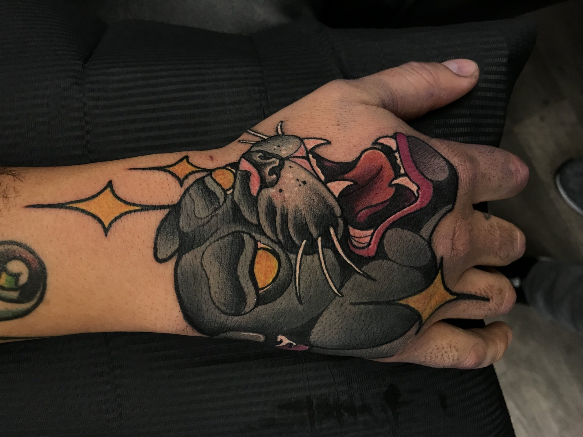 Hand panther tattoo