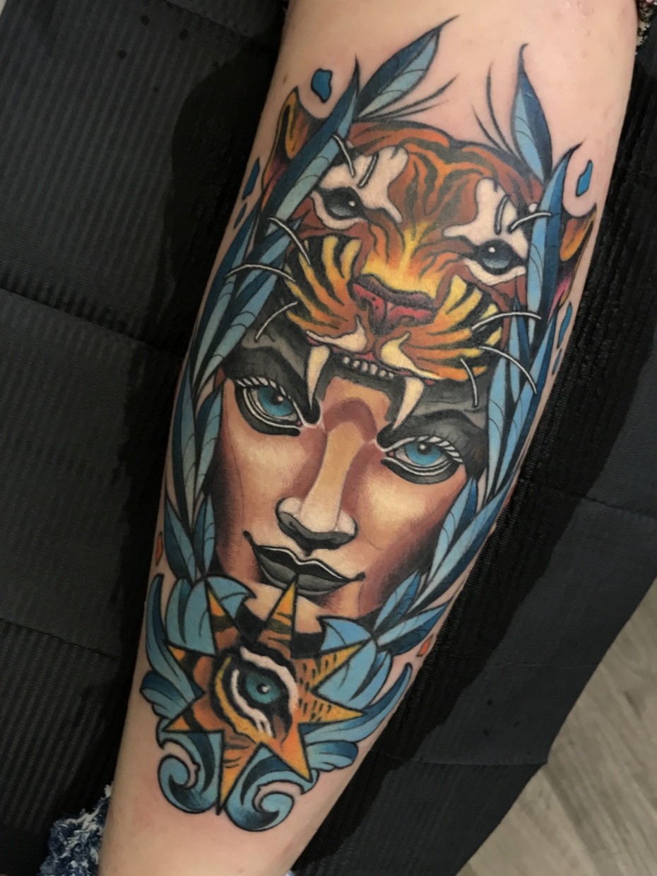 Neotraditional tiger and woman facetattoo